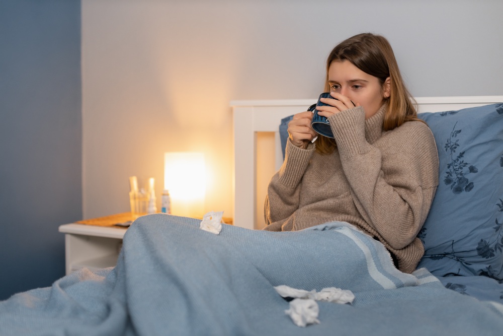 June-Frau-Bett-Grippe-Tee